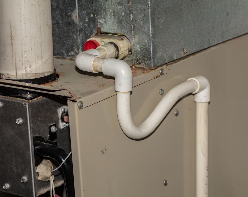 Air Conditioner Drain Line Runs Out Of Basement 
